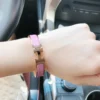 Hermes pink enameled bracelet with rose gold-tone border - Image 2